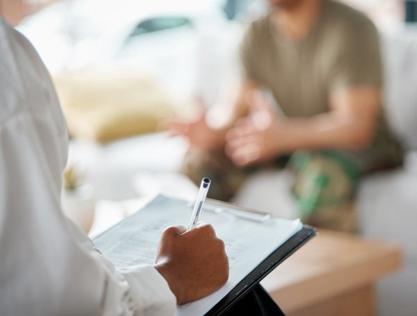 Counsellor speaking with a client during a counselling session
